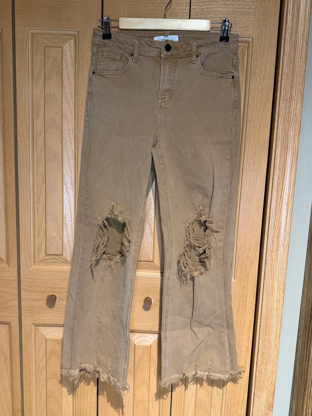 Risen Distressed Flared Jeans